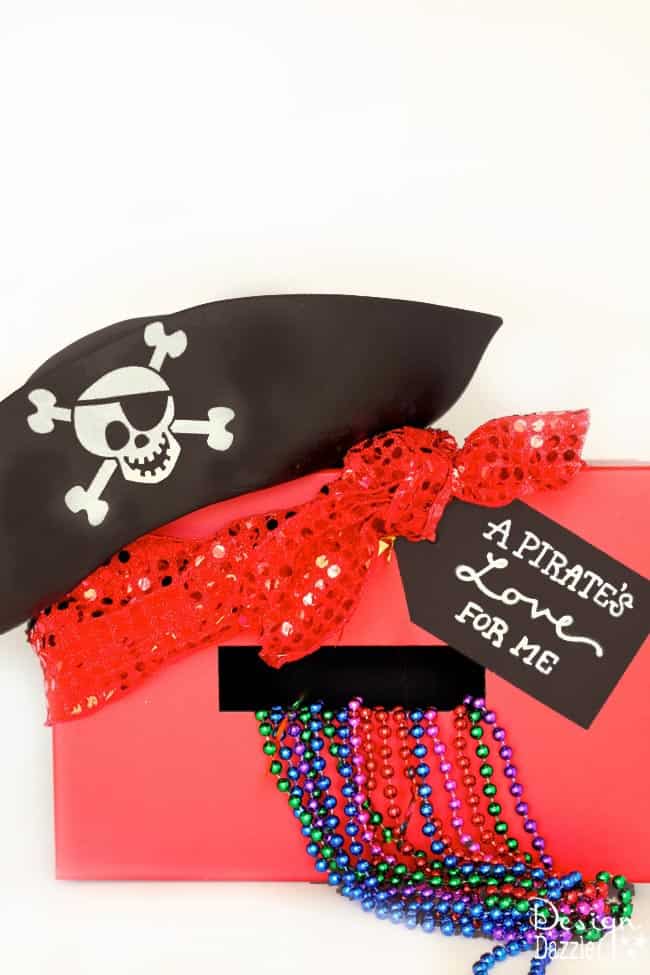 Craft with your kids this easy and cute Pirate Valentine Card Holder complete with FREE printable tag " A Pirate's Love For Me!" Design Dazzle