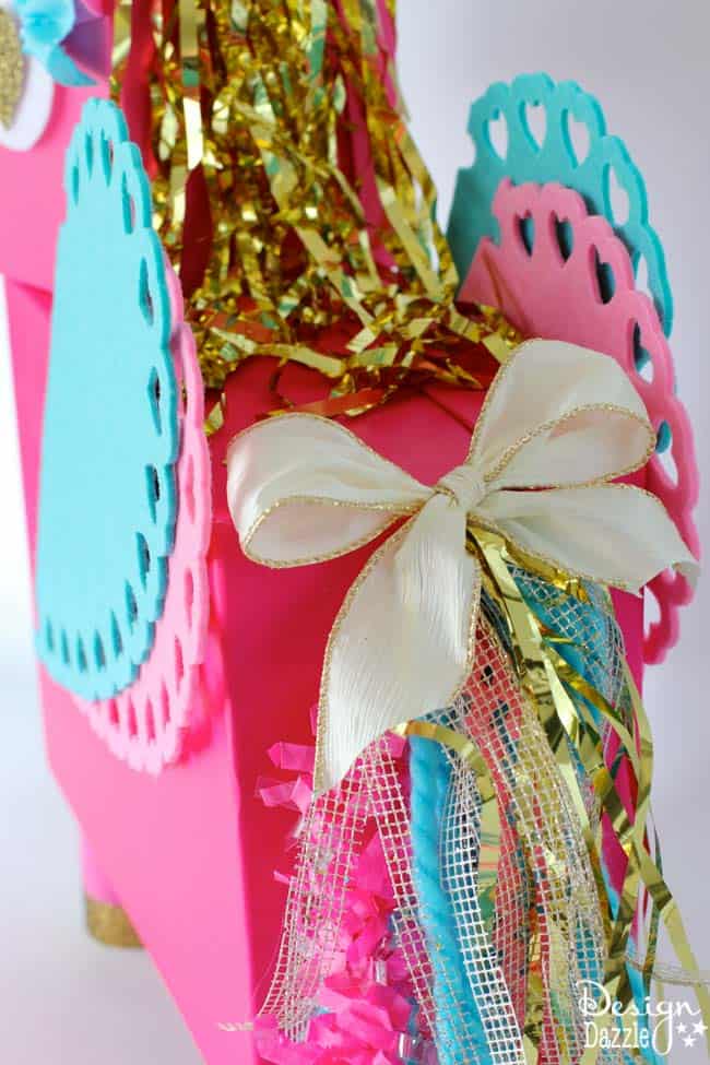 This Unicorn Valentine Card Box DIY project is a fun whimsical twist on a classic valentines card holder! This Unicorn just makes me smile! Step by Step instructions on Design Dazzle. 