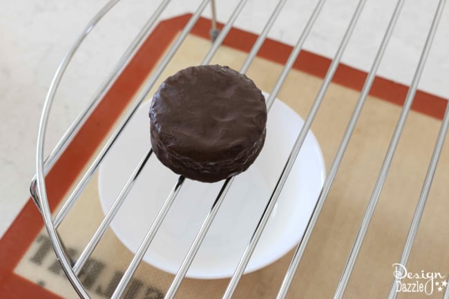 Easy Basketball Snack Cakes Made With Ding Dongs. Cute party idea for a absketball party or March Madness theme. Enjoy making with your family! Design Dazzle