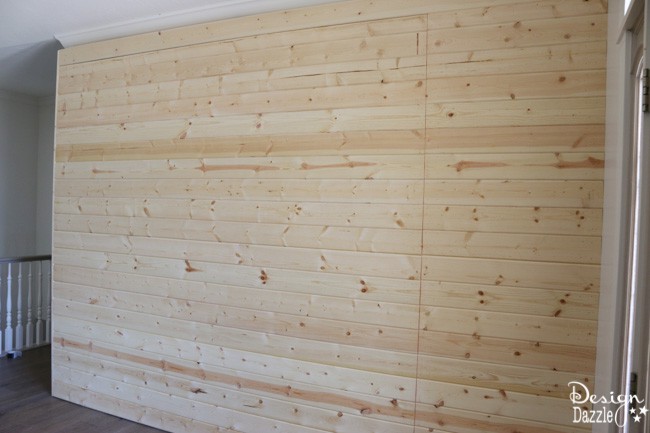 How to build a sliding wall to create a secret room. Yes, the wall slides open. Details on Design Dazzle