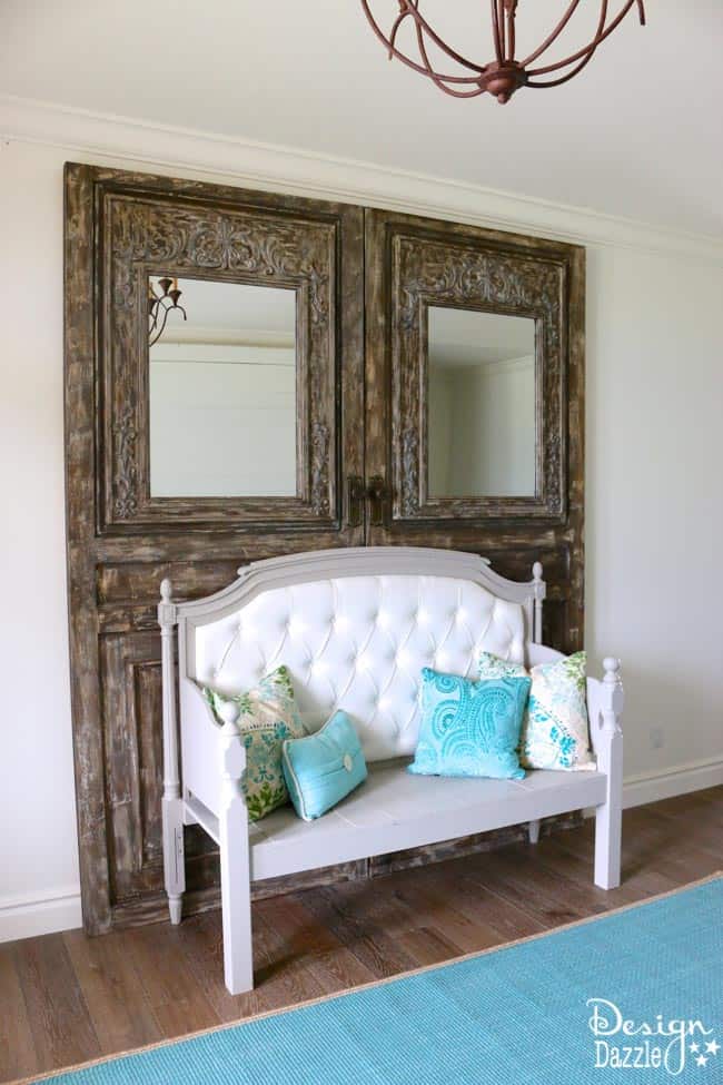 Entryway Room Makeover complete with sliding wall, "old" vintage doors and refurbished headboard/footboard bench | Design Dazzle