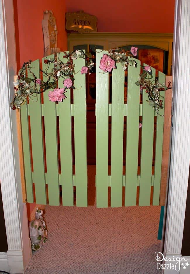 Craft room created using old kitchen cabinets. The tree with the blossom added just the right touch to my craft room. I loved turning on the fairy lights and crafting in there! Design Dazzle