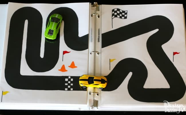 Racetrack Binder Free Printables! Summer is the perfect time to start a 3 ring binder for kids games/activities and start getting organized for play and travel. Print the racetrack on cardstock, place in a page protector and put in the binder! Design Dazzle