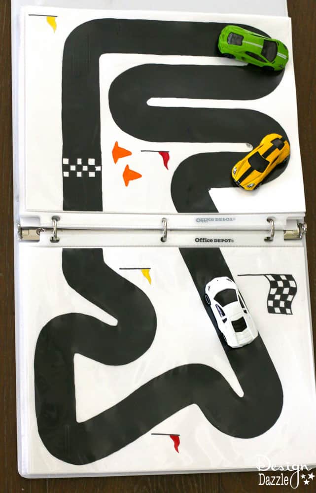 Racetrack Binder Free Printables! Summer is the perfect time to start a 3 ring binder for kids games/activities and start getting organized for play and travel. Print the racetrack on cardstock, place in a page protector and put in the binder! Design Dazzle