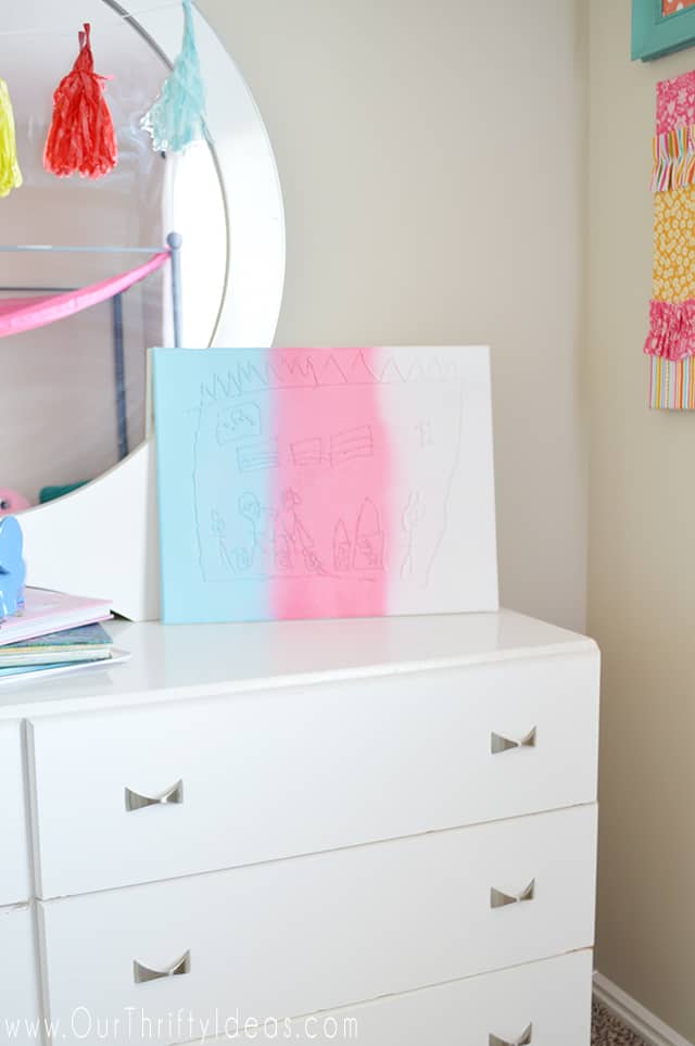 Such a fun way to turn your child's drawings into a piece of wall art!