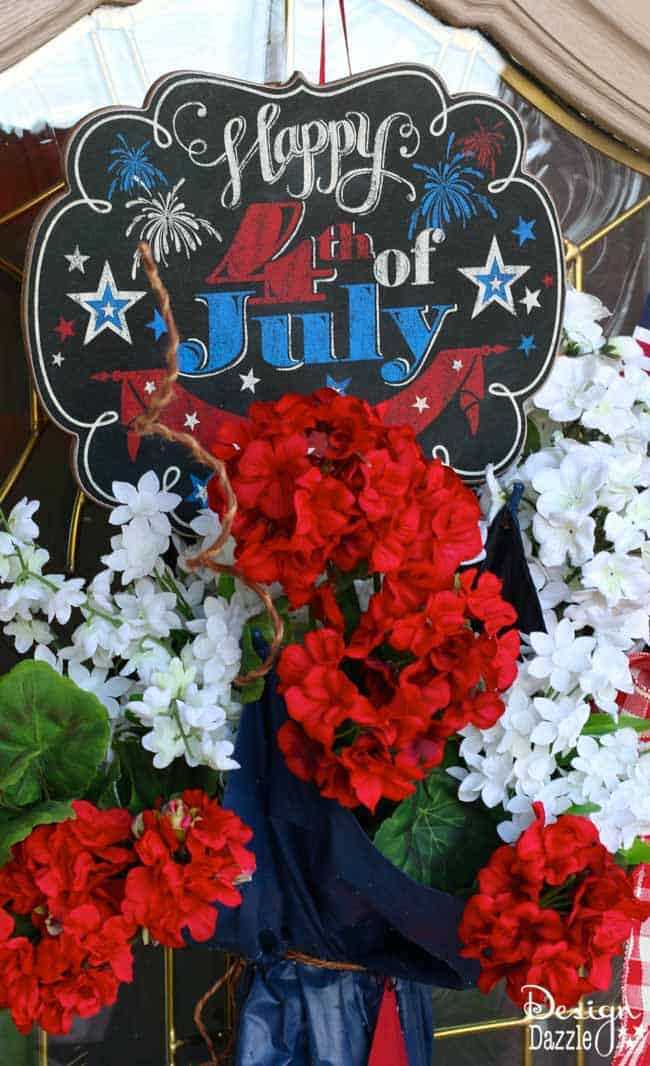 I took an old umbrella and re-purposed it into a fun and festive Umbrella 4th of July Door Decor that makes a great welcome door hanger. | Design Dazzle