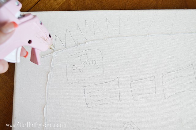 Such a fun way to turn your child's drawings into a piece of wall art!