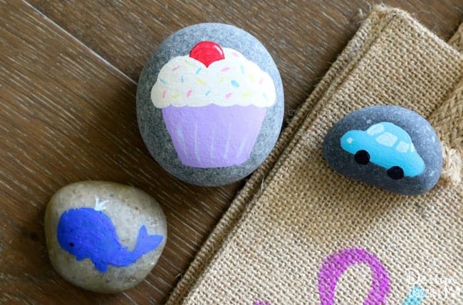 Kids will enjoy creating, making and playing with Story Stones. Keep them thinking and being creative with these super adorable story stones! The kids can tell fun tales with them | Design Dazzle