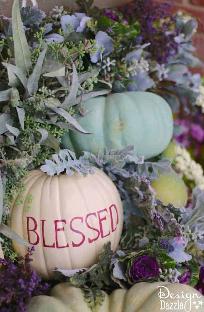 Fall pumpkin porch decor in plums, purples, blues and greens! Super cute DIY decorating ideas for 2018 fall! #fallfrontporch #frontdoordecoration #frontporchideas #fall || Design Dazzle