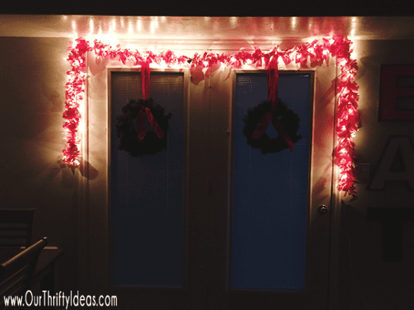 With just 3 simple supplies, you can create a custom Lighted Christmas Garland that will make your home decor pop this Christmas! Customize the length, colors and lights to make this easy craft all your own!