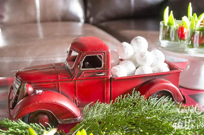 Create a Red Truck Christmas Party Table | Christmas tablescapes | Christmas table decor | Christmas kitchen decor | Christmas home decor | decorating for Christmas || Design Dazzle #christmastablescape #christmasdecor #christmastable