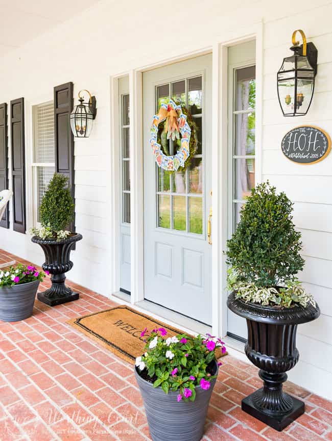 All 15 of these spectacular Springtime front porch ideas are creative, and versatile! There is a decorating idea here for all different tastes and styles. | Design Dazzle