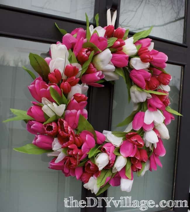 All 13 of these spectacular spring wreaths are simple to create, fun, creative, and will leave you with a gorgeous looking front door! | Design Dazzle