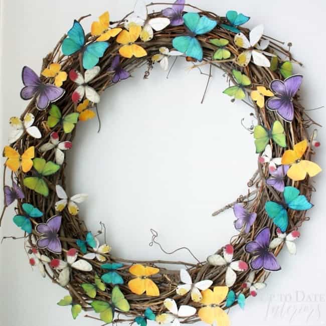 All 13 of these spectacular spring wreaths are simple to create, fun, creative, and will leave you with a gorgeous looking front door! | Design Dazzle