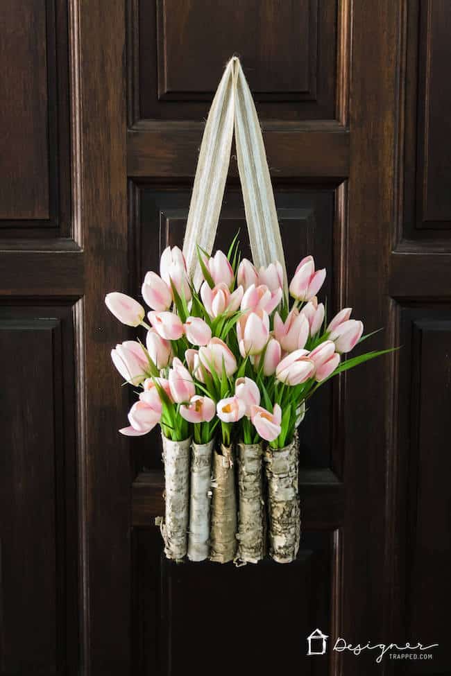 All 13 of these spectacular spring wreaths are simple to create, fun, creative, and will leave you with a gorgeous looking front door! | Design Dazzle