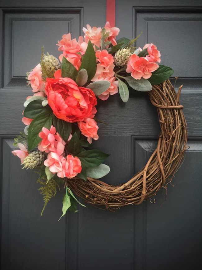 All 13 of these spectacular spring wreaths are simple to create, fun, creative, and will leave you with a gorgeous looking front door! | Design Dazzle