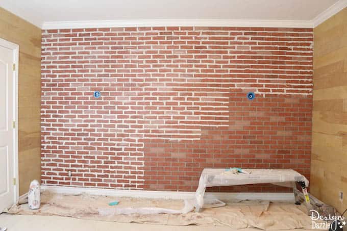 Would you like e a brick accent wall in your bedroom but think it's too expensive? This post shows how to make faux brick paneling look real. | Design Dazzle