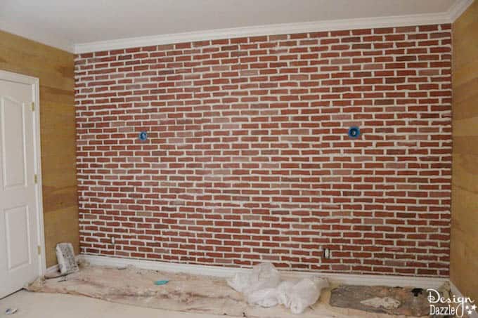Do you want to have a brick accent wall in your bedroom but think it's too expensive? This post shows how to make faux brick paneling look real. | Design Dazzle