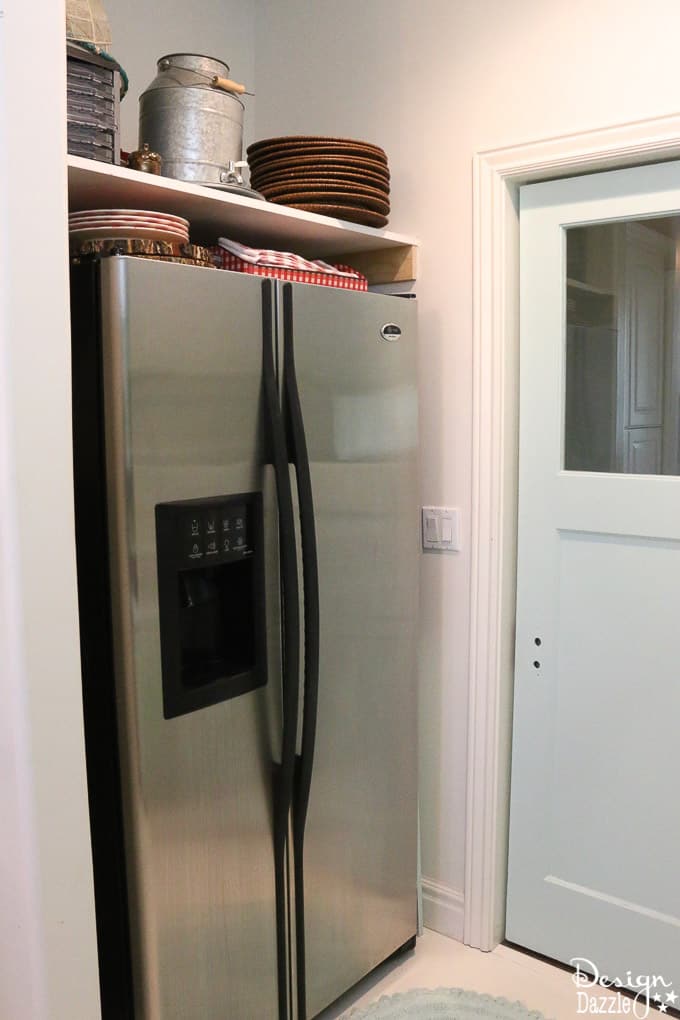 This post shows how I decorated with functional, practical, and organized decor in my Laundry Pantry Room combo. An organized laundry room is so important! | Design Dazzle