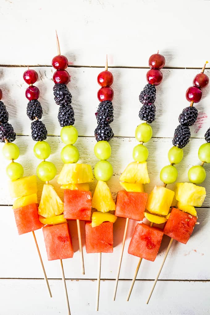 Scrap the sugar-filled popsicles and cool off with these DIY fruit kabobs!