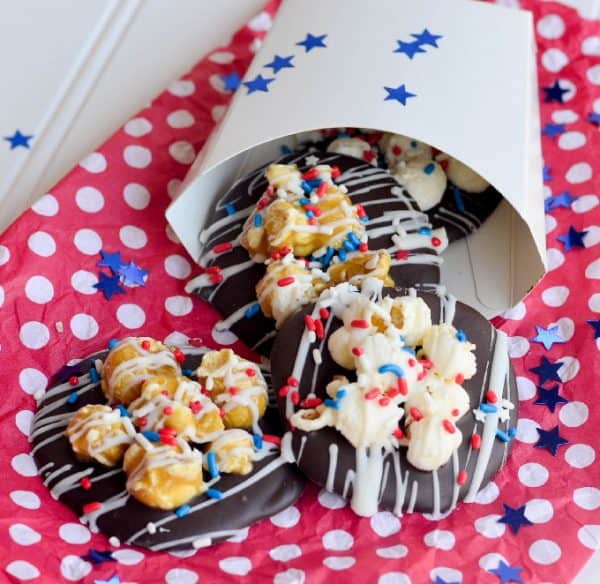 The hardest part of these Patriotic Chocolate Popcorn Puddles is waiting for the chocolate to set! These are a super delicious and simple treat to make!