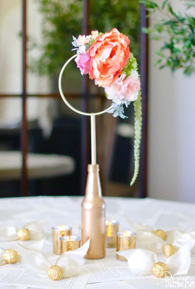 This gorgeous craft consists of anything and everything Harry Potter! Harry Potter Quidditch Bridal Shower Centerpiece complete with Golden Snitches. | Design Dazzle