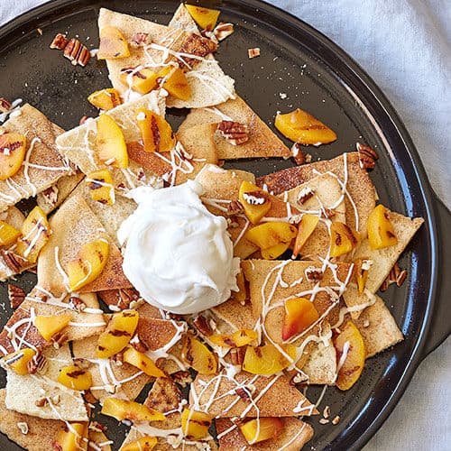 If you're looking for a great way to follow up your hearty plate of nachos, then these delicious dessert nacho recipes might be just what you're looking for! Design Dazzle