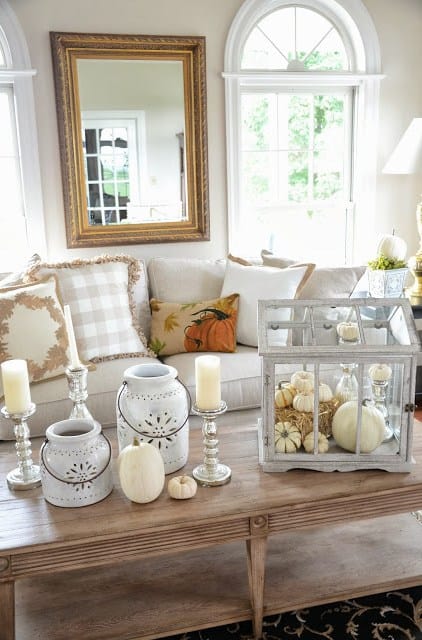 You don't always have to resort to reds and oranges. Here are 14 beautiful examples of using a neutral color palette to warm up your home for fall! | decorating for fall | neutral fall decor ideas | fall decorating tips | home decor tips for fall | neutral home decor for fall | fall decor tips || Design Dazzle