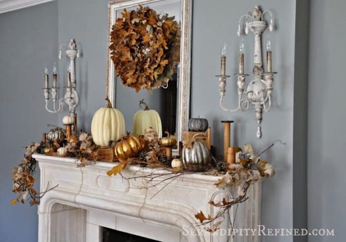 You don't always have to resort to reds and oranges. Here are 14 beautiful examples of using a neutral color palette to warm up your home for fall! | decorating for fall | neutral fall decor ideas | fall decorating tips | home decor tips for fall | neutral home decor for fall | fall decor tips || Design Dazzle