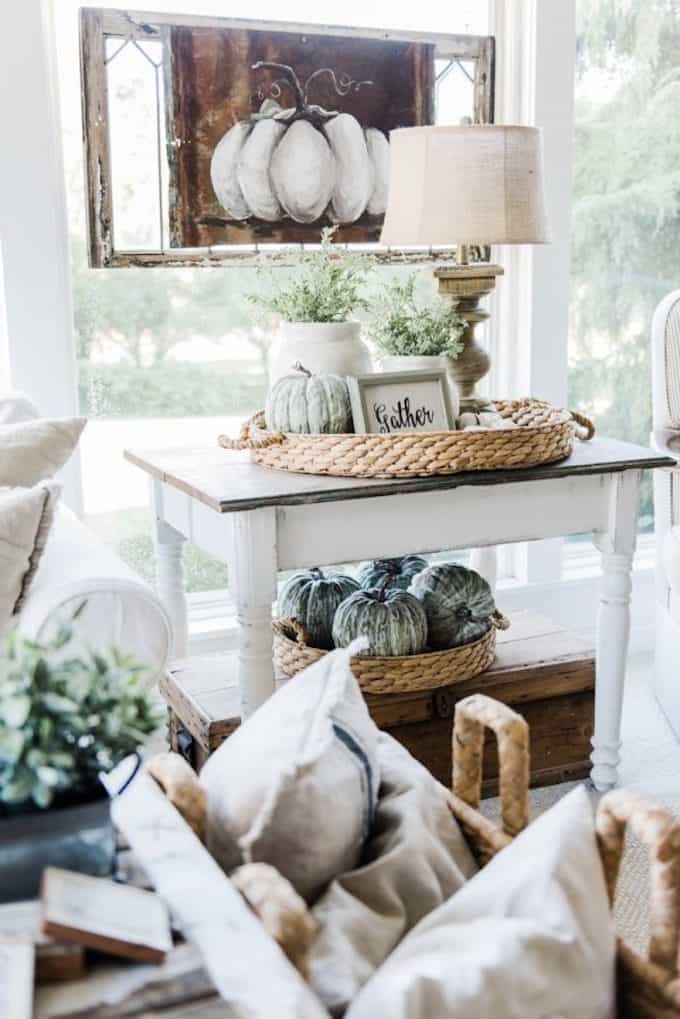 You don't always have to resort to reds and oranges. Here are 14 beautiful examples of using a neutral color palette to warm up your home for fall! | decorating for fall | neutral fall decor ideas | fall decorating tips | home decor tips for fall | neutral home decor for fall | fall decor tips || Design Dazzle