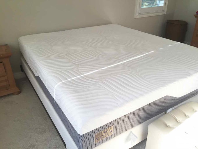 If you're looking for a bed that's inviting, comfy, and inexpensive then you've come to the right place! This post has the details of my favorite mattress. | Design Dazzle