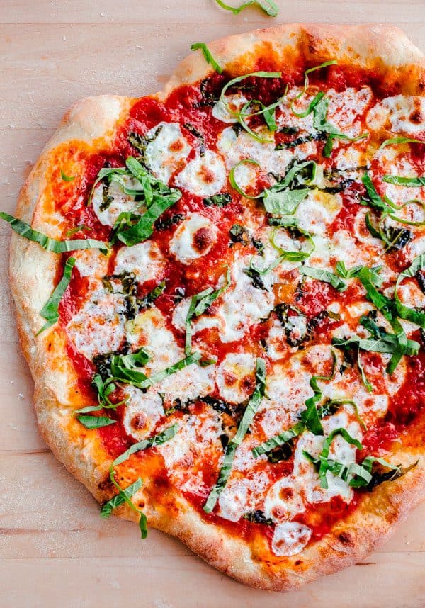 I found 12 of the most perfect, mouth watering, pizza recipes out there that will have you drooling just thinking about them! | homemade pizza recipes | easy pizza recipes | pizza recipe ideas || Design Dazzle #pizzarecipes #homemadepizza #pizza