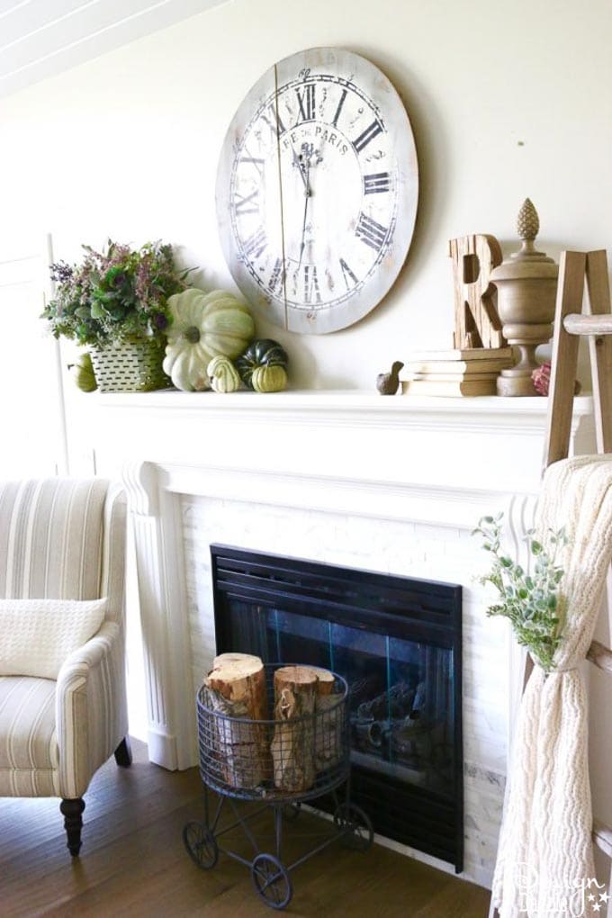 Create a unique fall mantel with incorporating beautiful and fun fall colors like greens, plums, lavender, blues, and sage. | decorating for fall | fall home decor tips | fall home decor ideas | fall decorating tips | fall mantel decor ideas | how to decorate a fall mantel || Design Dazzle