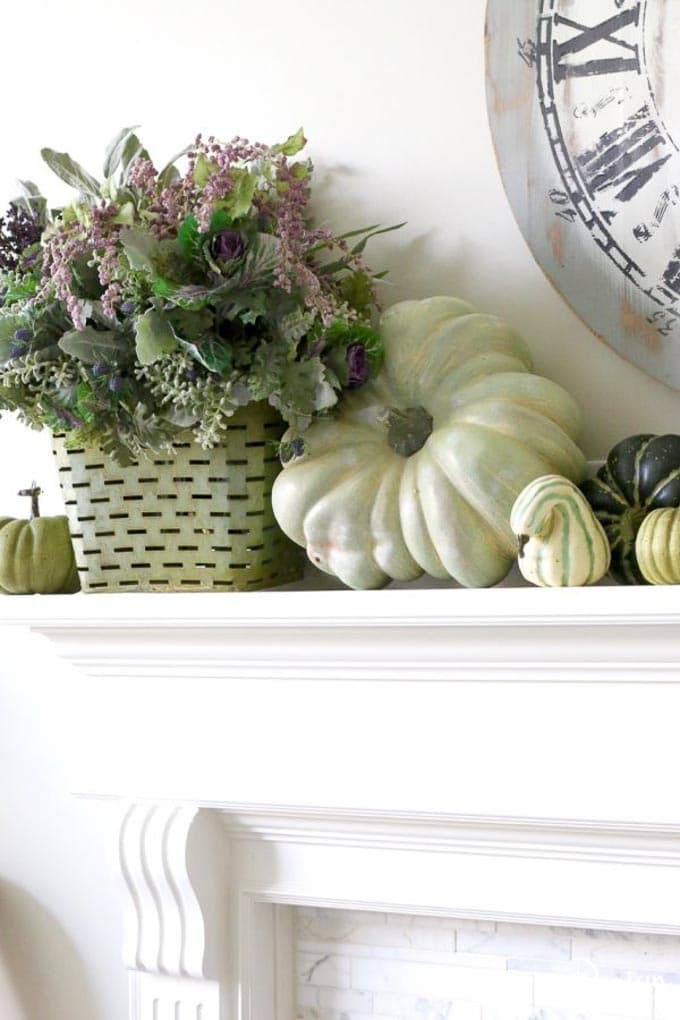 Create a unique fall mantel with incorporating beautiful and fun fall colors like greens, plums, lavender, blues, and sage. | decorating for fall | fall home decor tips | fall home decor ideas | fall decorating tips | fall mantel decor ideas | how to decorate a fall mantel || Design Dazzle