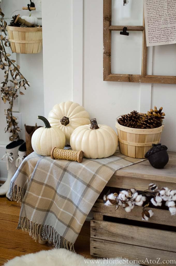 I have rounded up 16 of my favorite ways to decorate for fall so your home can be perfectly plaid and ready for the season! | plaid decor for fall | fall plaid decor | home decor for fall | plaid home decor ideas | decorating with plaid | plaid decorating tips for fall | fall home decorating tips || Design Dazzle