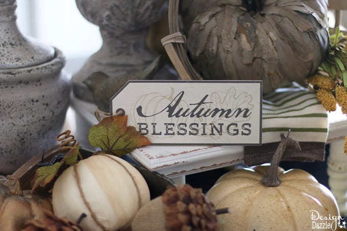 Fall is one of my favorite seasons to decorate. I’m sharing my go to DIY tutorial on creating a fall centerpiece with step-by-step photos here! These gorgeous farmhouse ideas are perfect for your home decor this fall season. #fall #falldecorideas #centerpiece #diyhomedecor #DIY || Design Dazzle