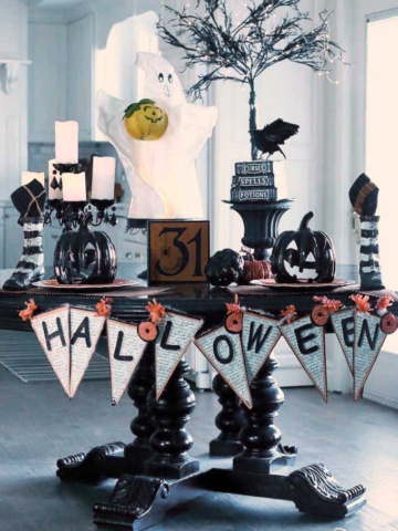 Having a cute Halloween tablescape is my favorite part of my Halloween decor! See how I used my kitchen table as the highlight of my decorations. | halloween decor ideas | decorating for halloween | halloween tablescape ideas || Design Dazzle #Halloweendecor