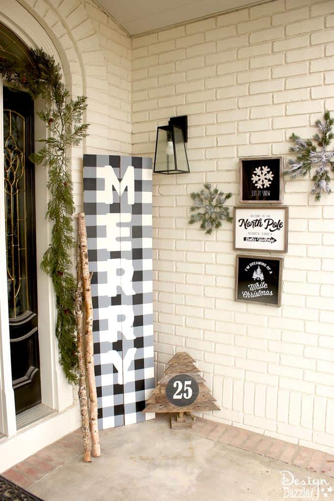 My black and white Christmas porch is a different twist on your typical Christmas porch decor and I think you'll love how it turned out! | holiday porch decor | outdoor decor for Christmas | Christmas porch decor | black and white holiday decor | black and white Christmas decor || Design Dazzle #christmasporch #holidayporch #outdoorchristmasdecoration 