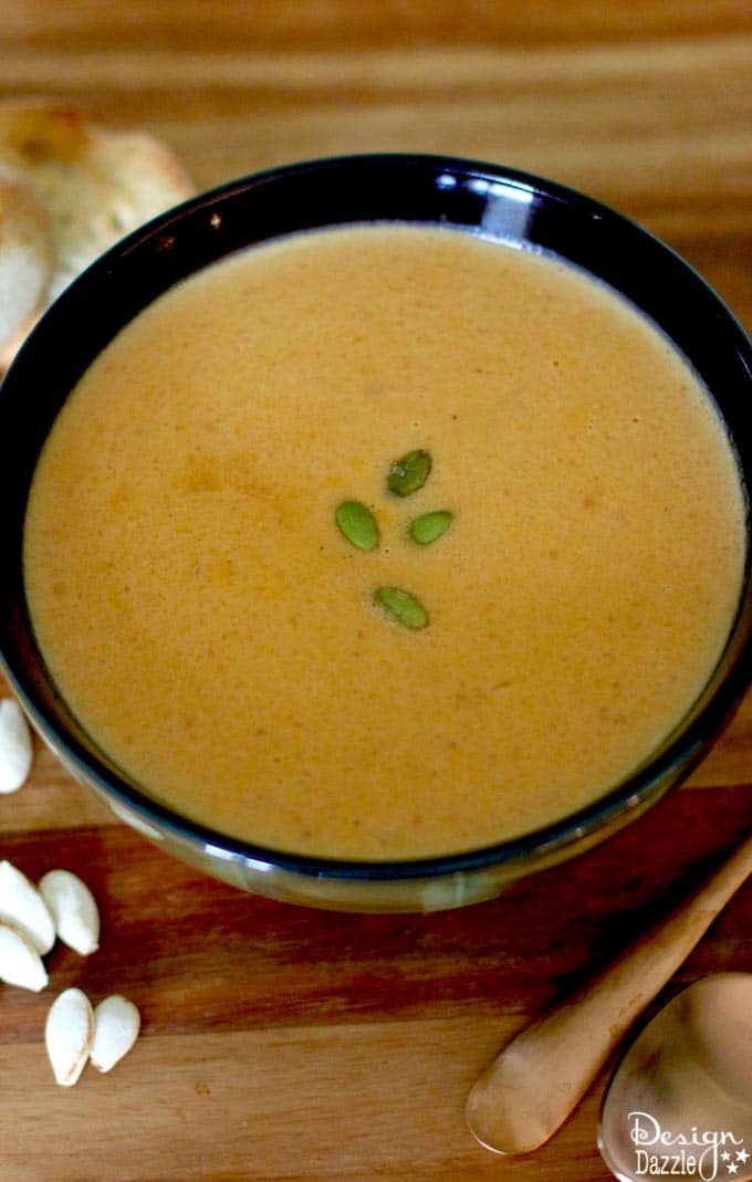 This pumpkin soup recipe is yummy and it freezes easily! It's the perfect meal for around the holidays! It's cozy, warm, fast, easy, and delicious. | homemade pumpkin recipes | fall soup recipes | pumpkin soup recipe | healthy soup recipe | fall recipe ideas || Design Dazzle #souprecipes #pumpkinsoup #pumpkinrecipe #fallrecipes 