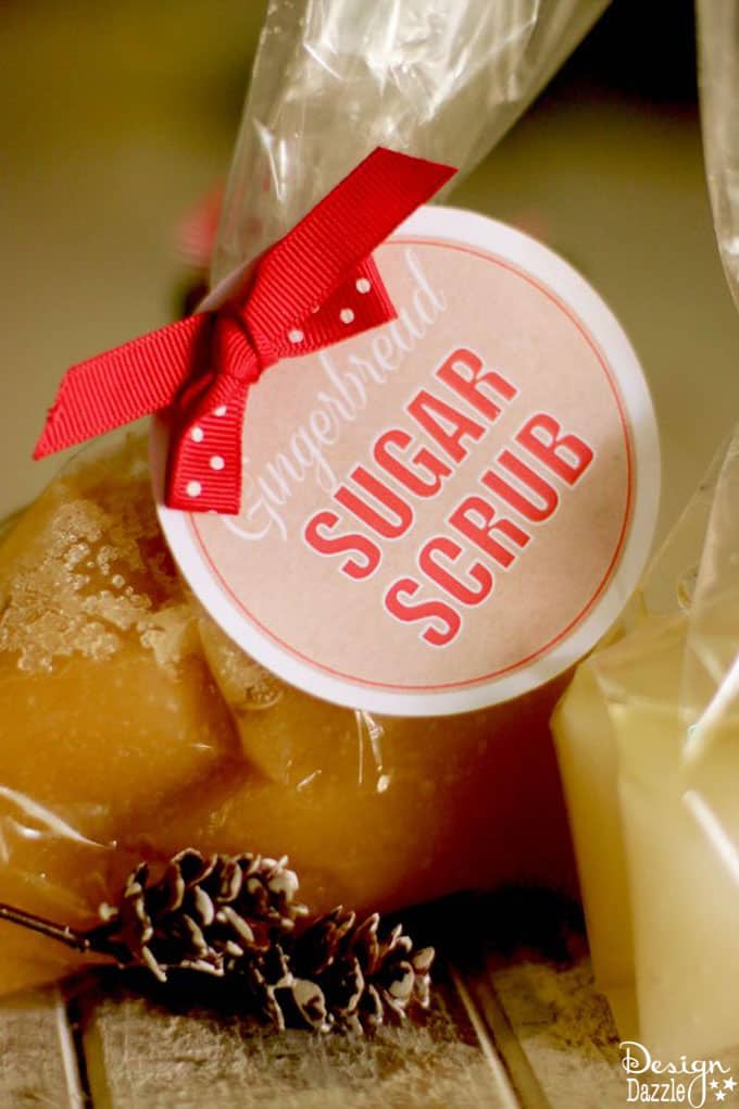 Who wouldn't love to receive darling, scented sugar scrubs as a present? Sugar scrubs smell yummy and make your skin feel silky smooth. | sugar scrub gift ideas | homemade holiday gifts | homemade sugar scrubs | free holiday printables | holiday sugar scrub recipes || Design Dazzle #sugarscrub #holidaysugarscrub #sugarscrubrecipe 