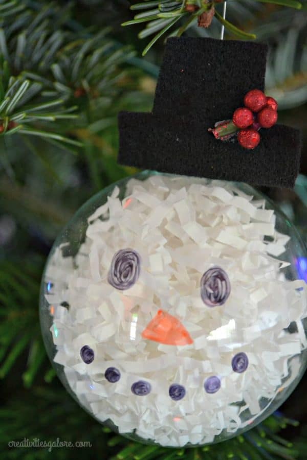 Want a fun and easy activity to do at a Christmas party? Then this DIY snowman ornament is the perfect craft for you and your guests.