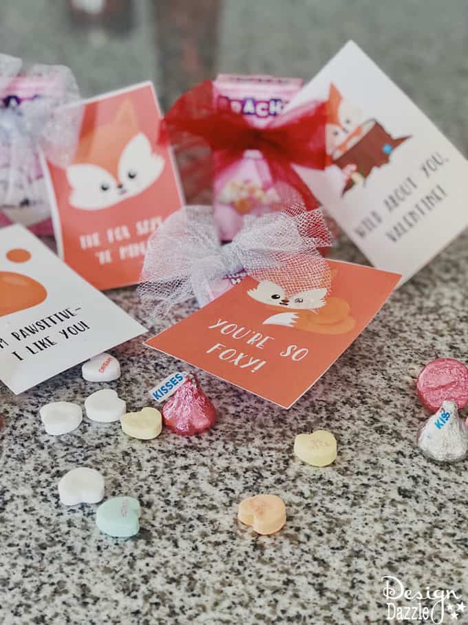 The expenses of buying Valentine's Day cards can really add up! These adorable Free Printable Foxy Valentines are the perfect solution! | Design Dazzles