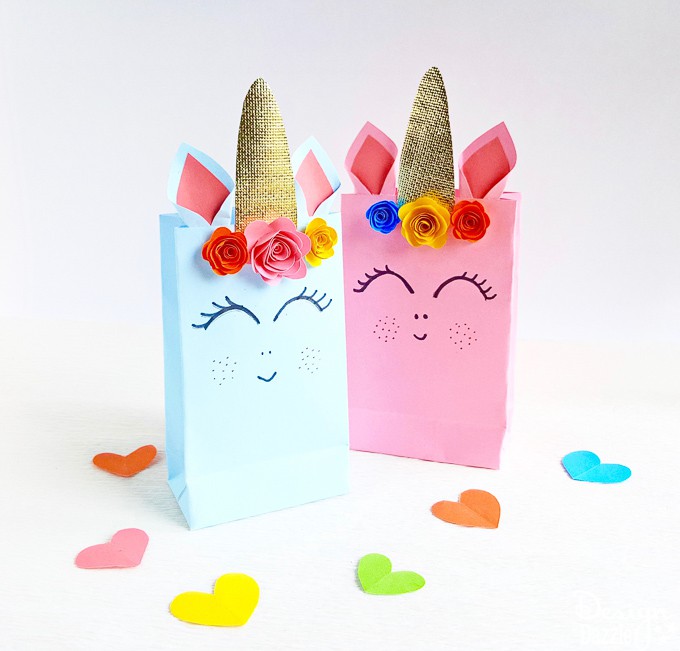 We are sharing simple step by step instructions for these adorable Unicorn Gift Bags plus a free pattern! | Design Dazzle