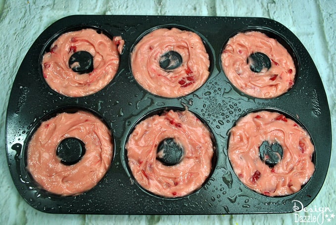 The step by step instructions and recipe to make these baked yummy strawberry donuts for yourself! This is a recipe that your family will LOVE!  | Design Dazzle