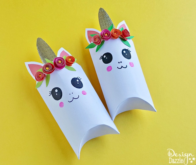 Unicorns are all the rage these days! Here is an adorable unicorn favor box and free template that will bring magic to every party | Design Dazzle