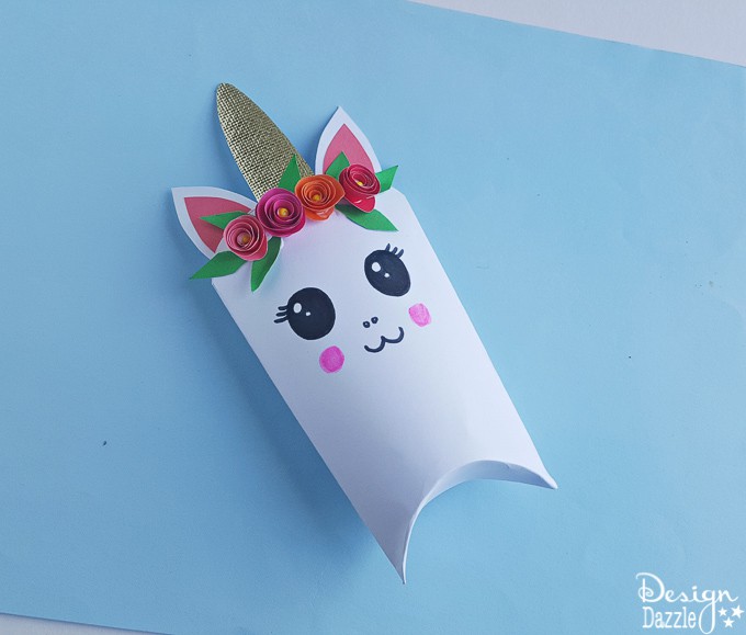 Unicorns are all the rage these days! Here is an adorable unicorn favor box and free template that will bring magic to every party | Design Dazzle
