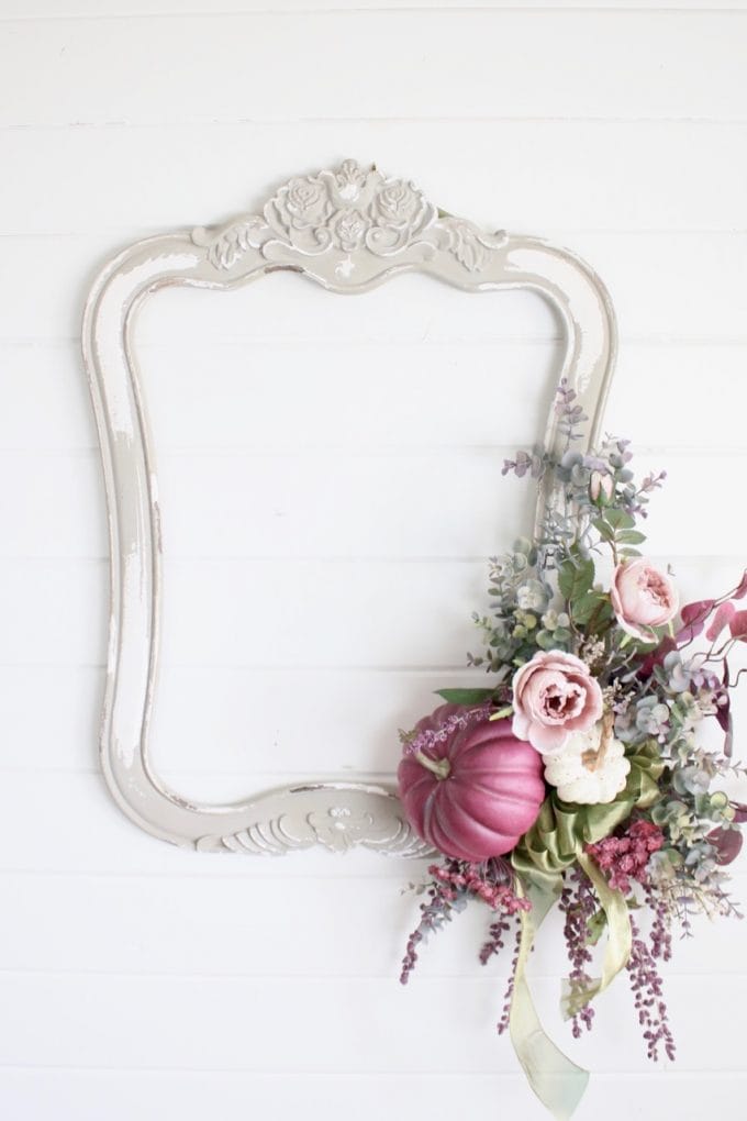 Gorgeous Picture Frame Wreath that is perfect for a fall front door! Loving the idea of purple tones for this DIY wreath. This tutorial shows your how to make a wreath that showcases some beautiful fall colors! #wreath #fall #DIY| Design Dazzle