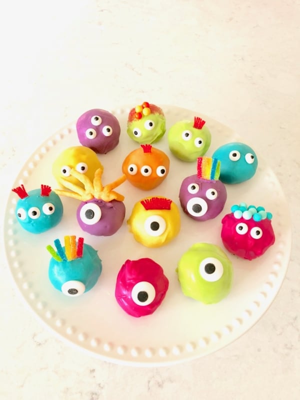 TWO ingredients and then dipped the Oreo Truffle balls in melted candy and you've got some VERY CUTE colorful monster Oreo truffle balls! - Design Dazzle