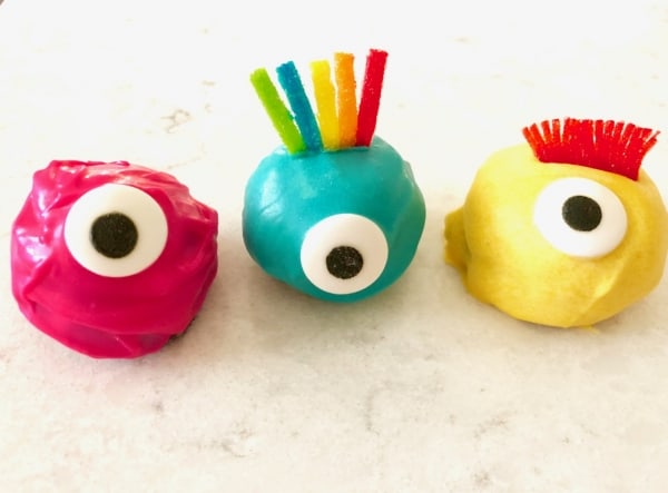 TWO ingredients and then dipped the Oreo Truffle balls in melted candy and you've got some VERY CUTE colorful monster Oreo truffle balls! - Design Dazzle