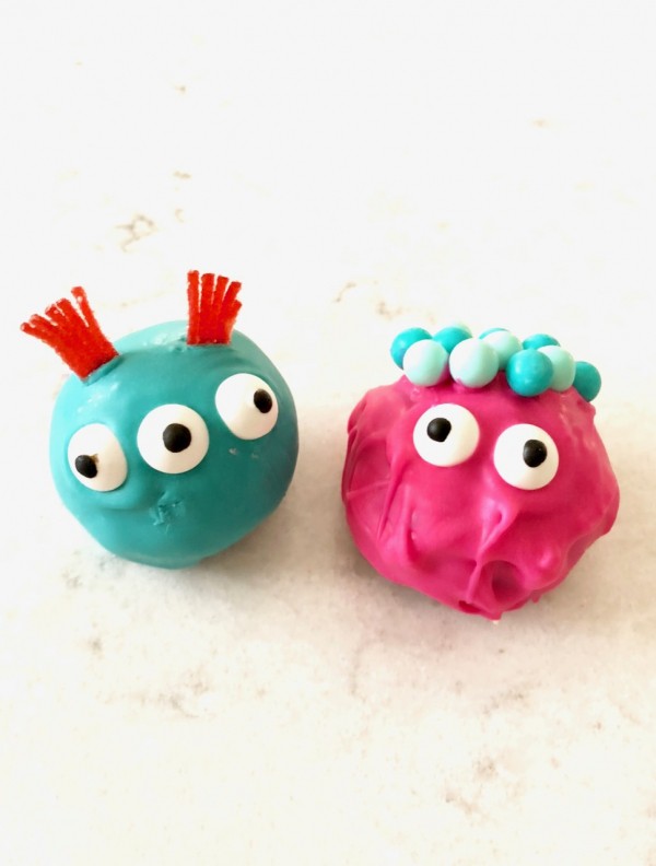 TWO ingredients and then dipped the Oreo Truffle balls in melted candy and you've got some VERY CUTE colorful monster Oreo truffle balls! - Design Dazzle